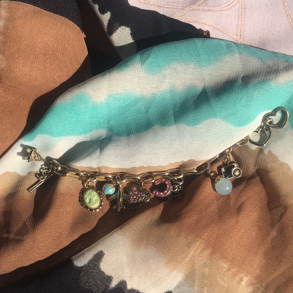 A cookie Lee bracelet with lifetimes travel theme